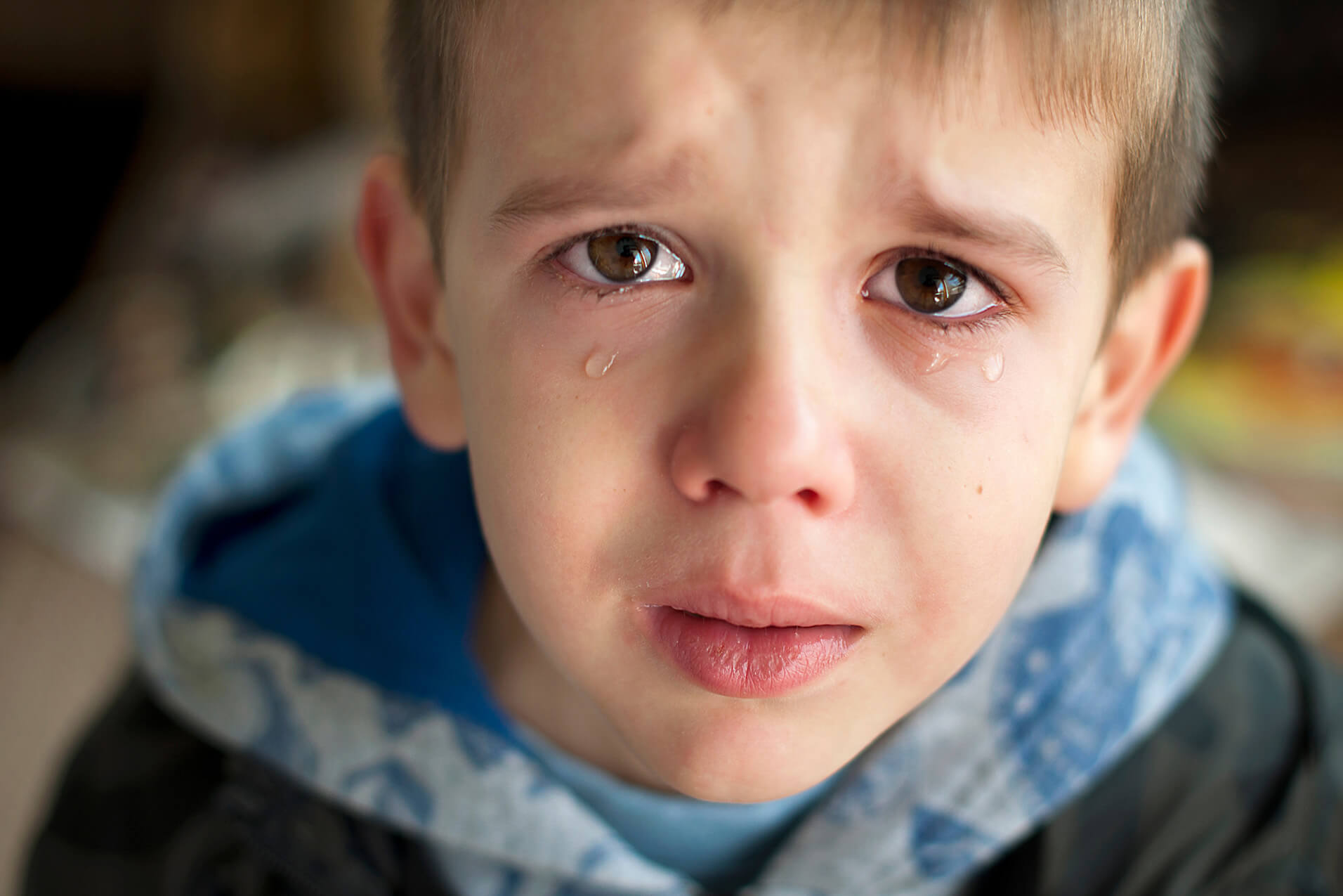 young boy crying